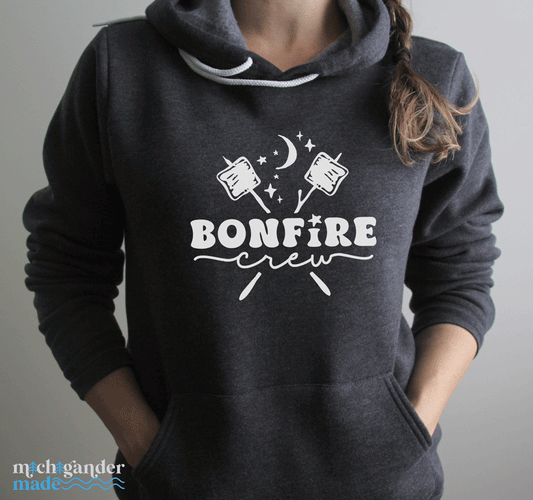 A fleece hoodie in dark grey heather with Michigander Made Bonfire design