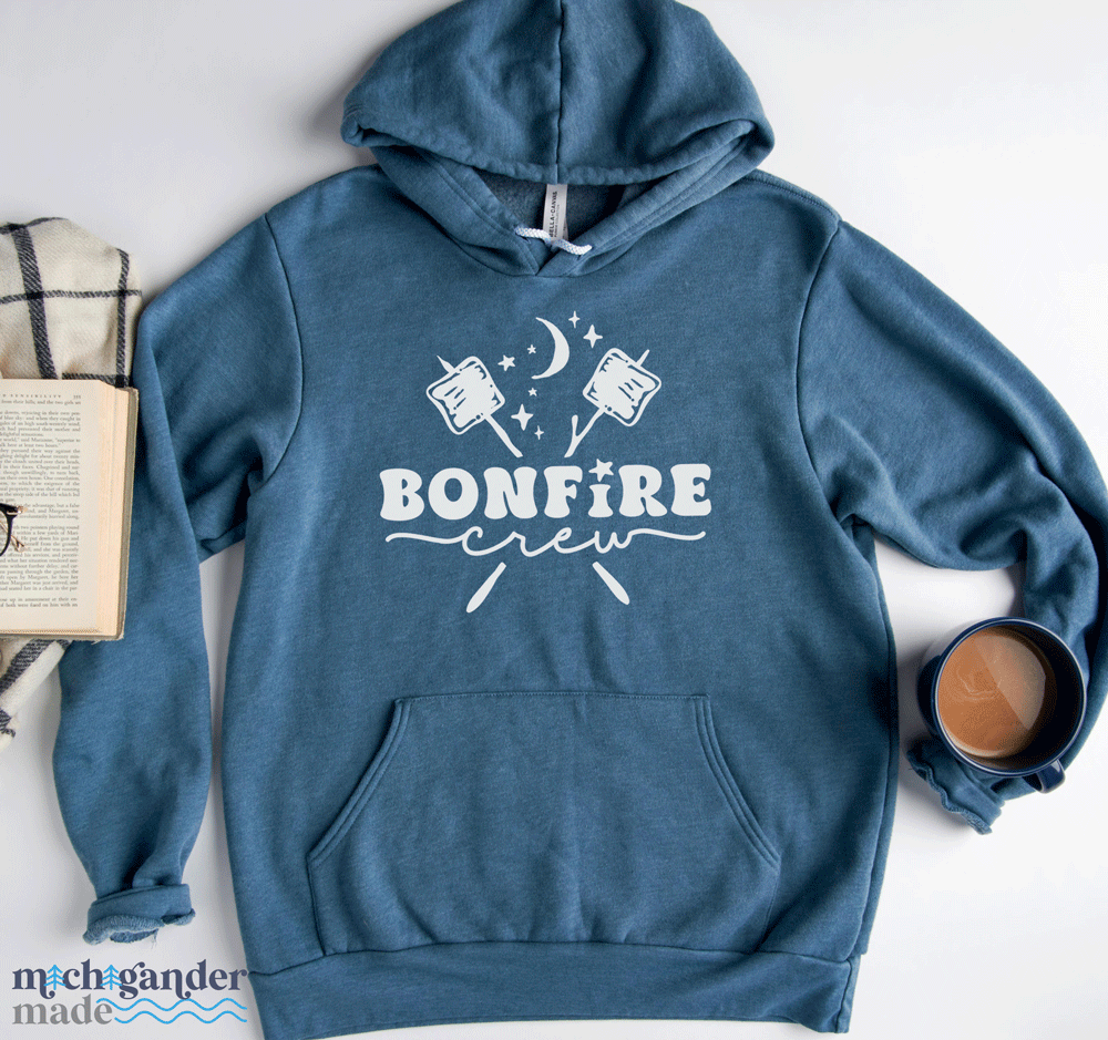 A fleece hoodie in slate with Michigander Made Bonfire design