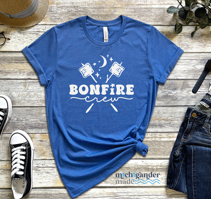 A Bella and Canvas tshirt in heather true royal with Michigander Made Bonfire design