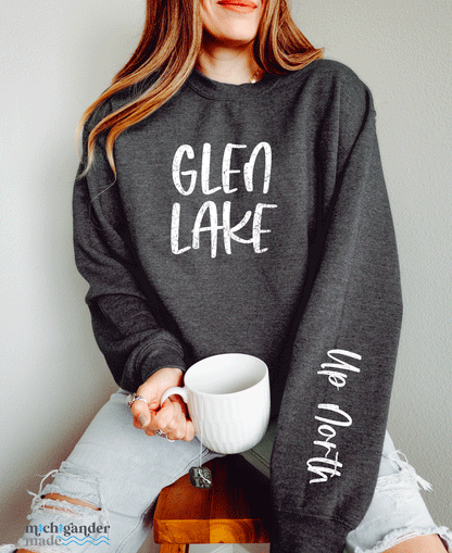 A gildan crew in dark heather for Glen Lake with sleeve print a Michigander Made design