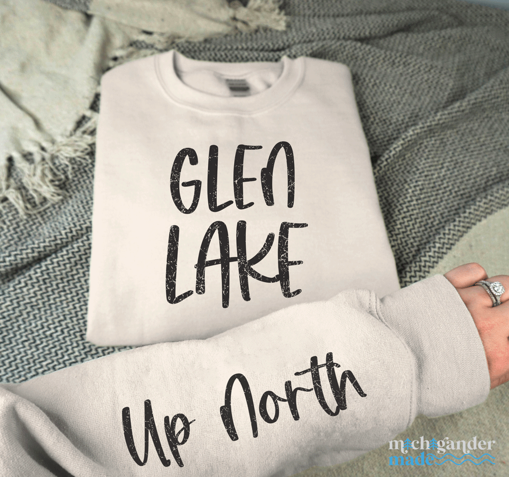 A gildan crew in sand color for Glen Lake with sleeve print a Michigander Made design