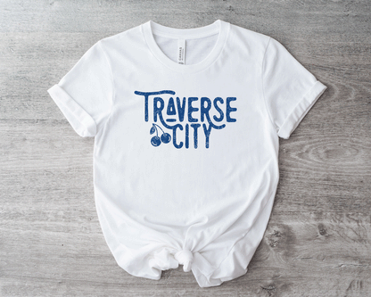 Traverse City t-shirt with a cherry in the logo. Traverse city one of a kind design tee. Traverse City tee.